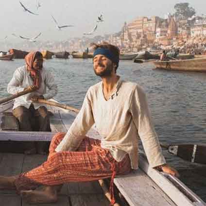 A Morning boat ride along the sacred Ganges River in Varanasi at Assi Ghat